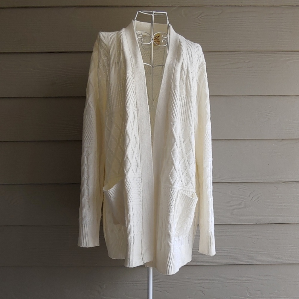 Cream colored oversized knitted sweater